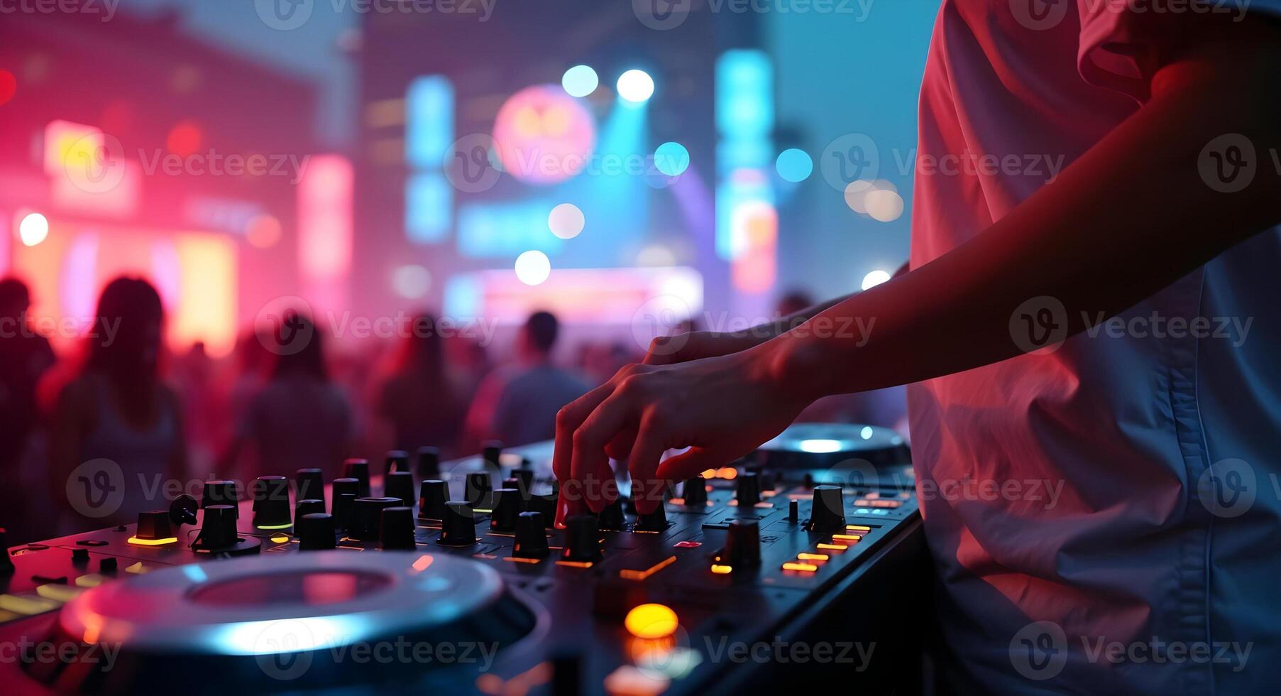 DJ Mixing Music at a Lively Party with Colorful Lights photo