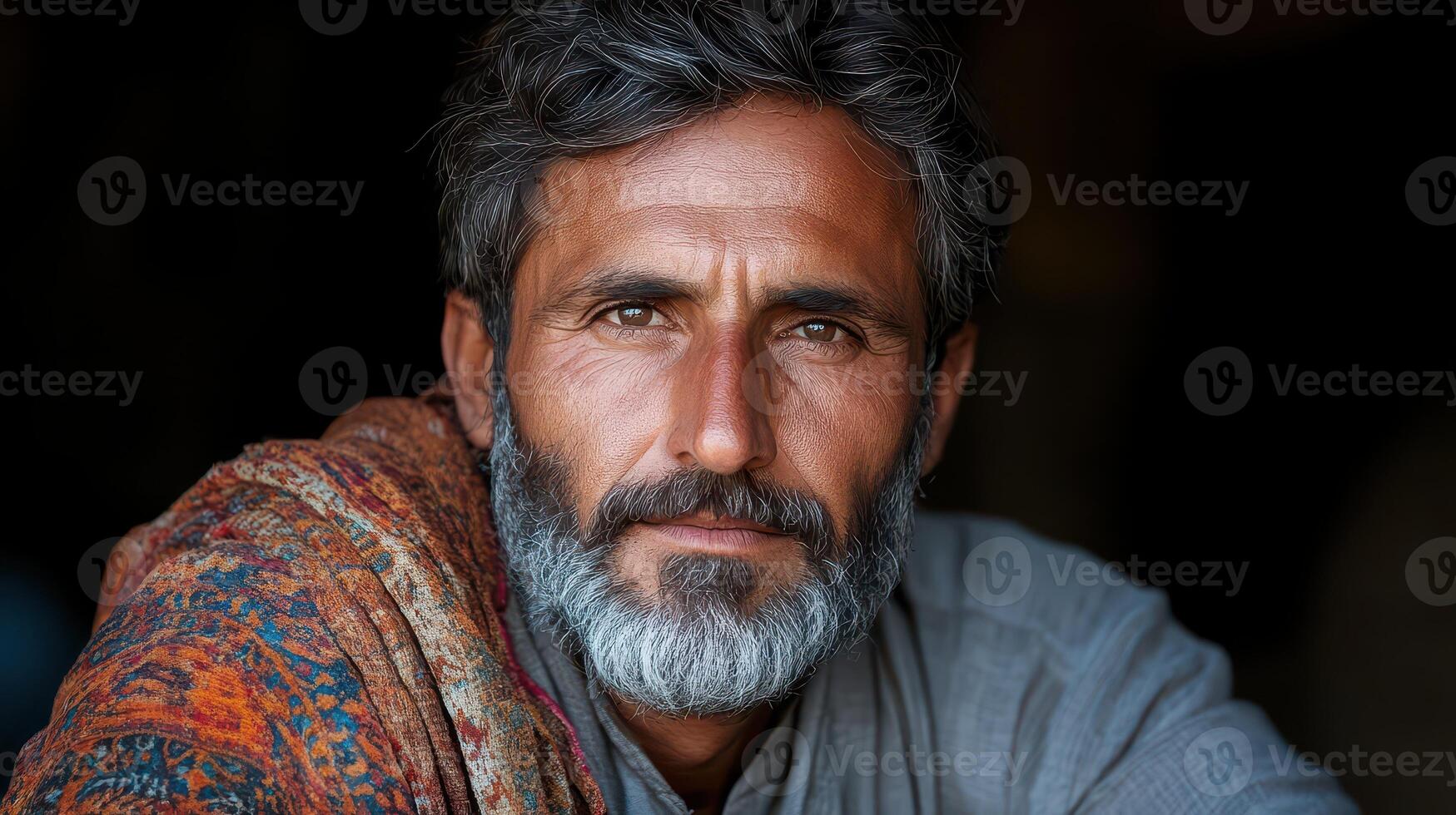 A man with a beard and a turban photo