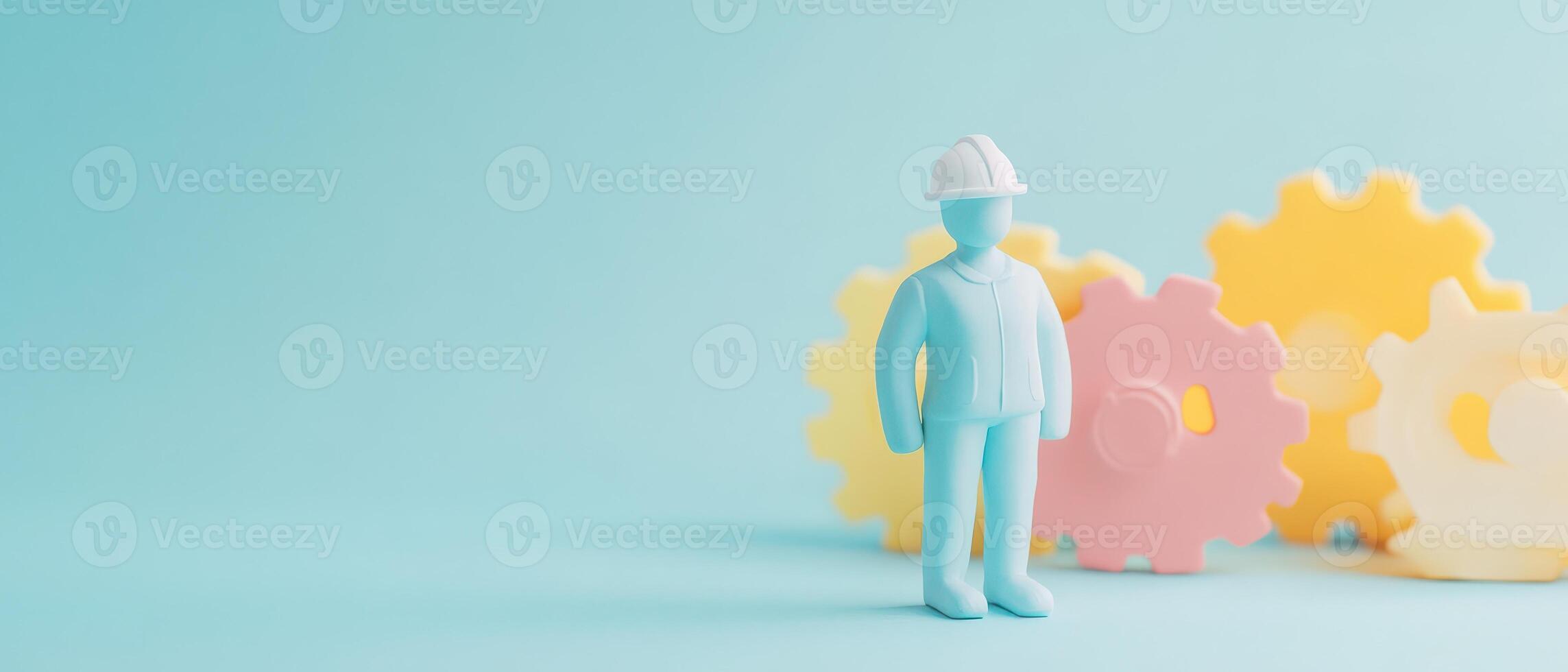 A small figurine of a man standing in front of a group of colorful gears photo