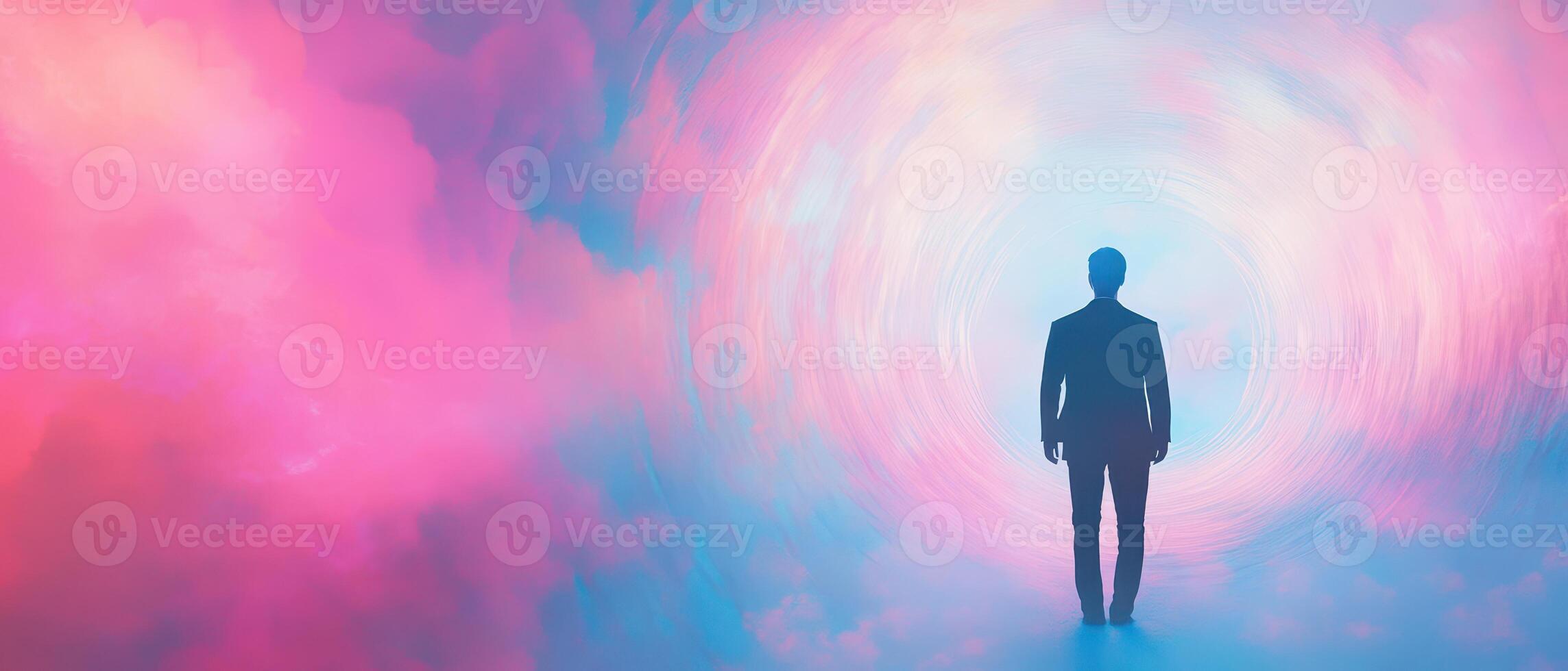 A man standing in front of a colorful vortex photo