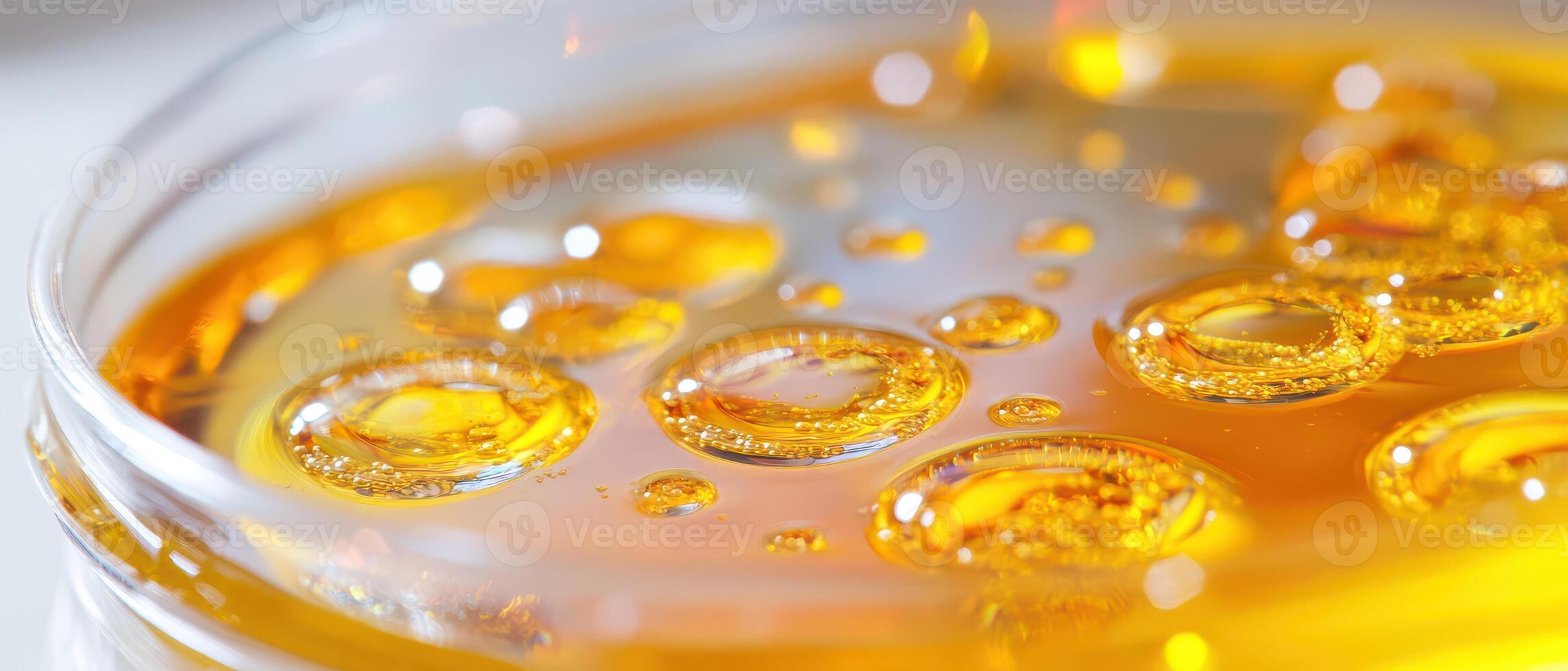 A close up of a glass filled with oil photo