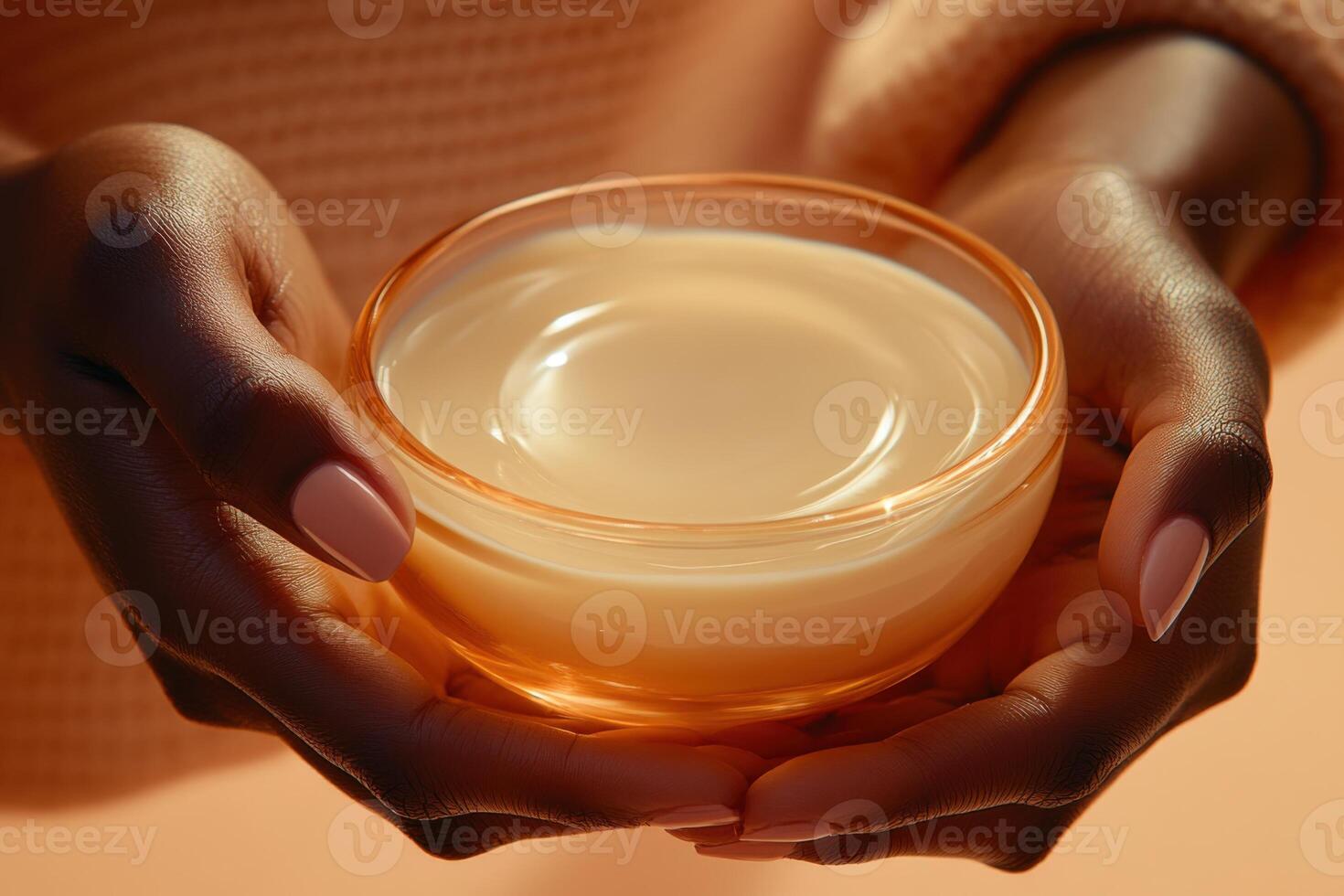 Woman hands holding face cream. Spa beauty product for skin care. Smooth lotion in glass bowl. Treatment for healthy glow skin. photo