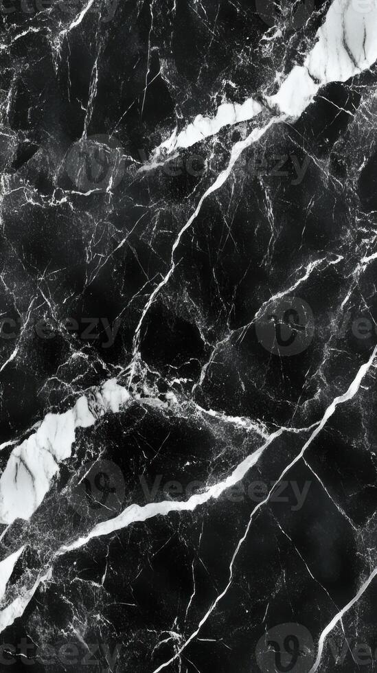 Dark surface. Black stone with white veins. Mineral texture. Detailed close up view of polished marble. Vertical abstract background photo