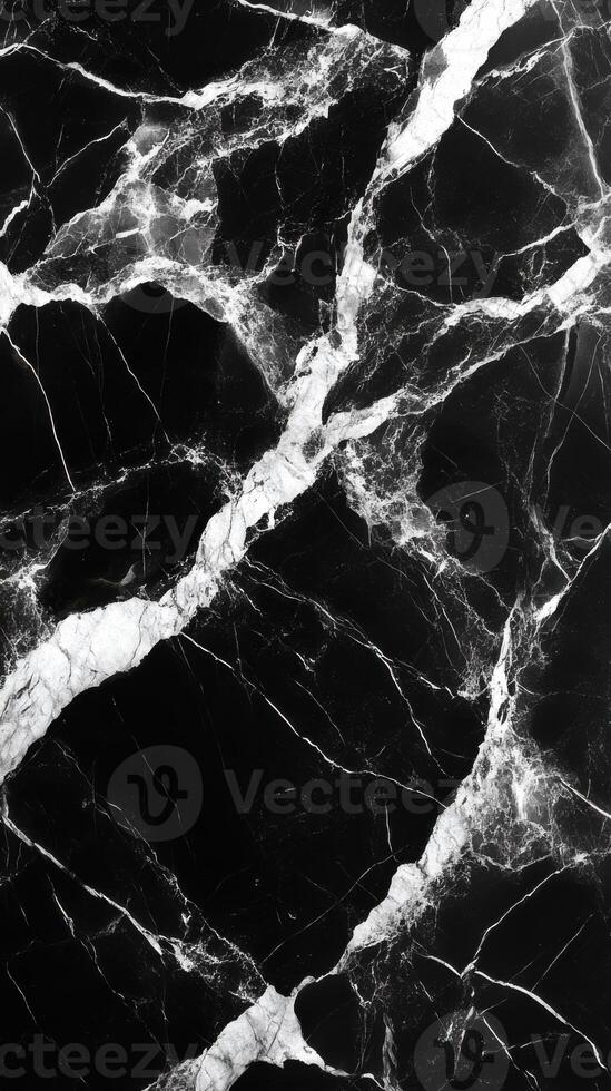 Black stone surface. White veins texture. Dark marble pattern. Natural rock background. Elegant detail. Interior decoration material. photo