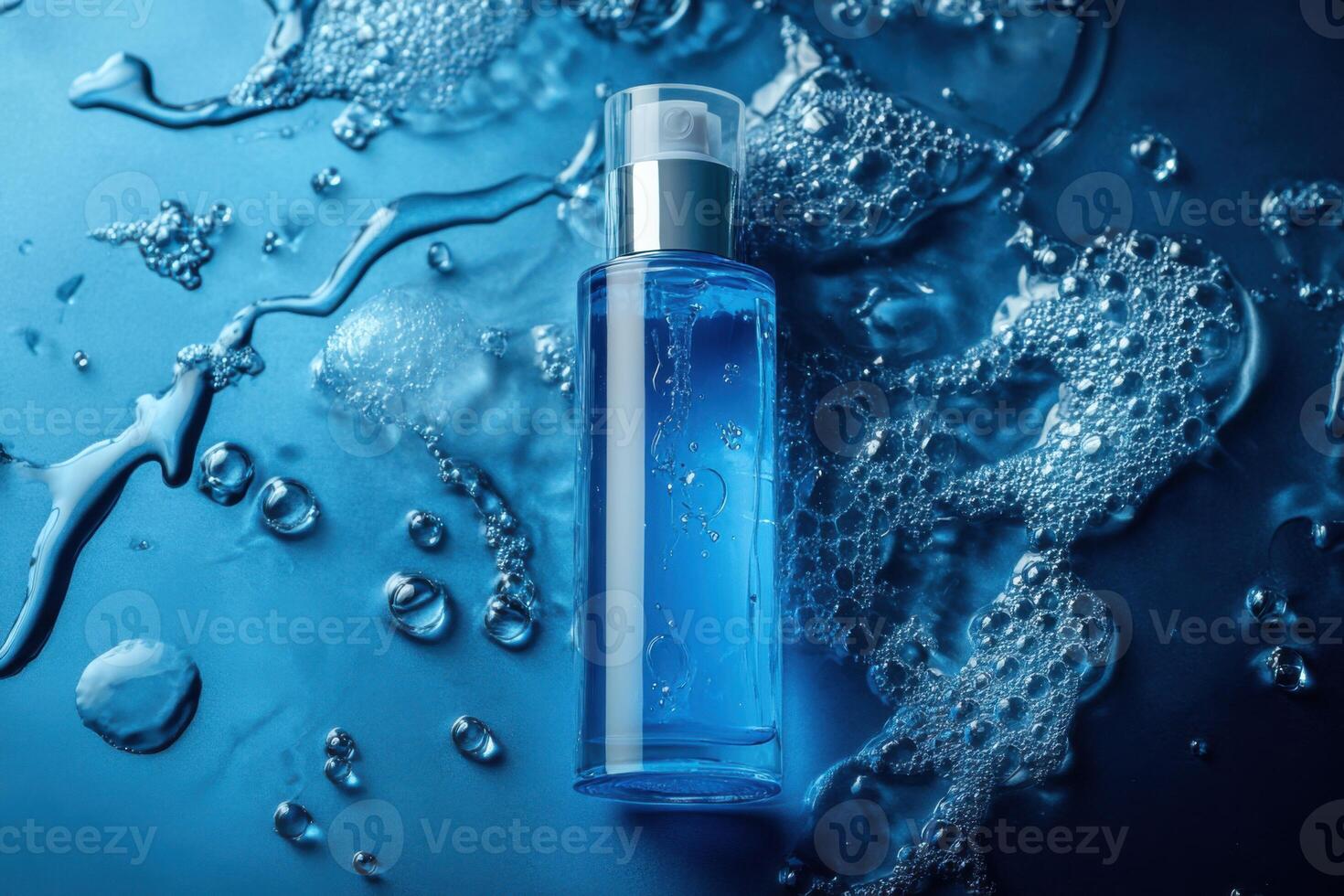 Blue liquid inside glass bottle. Beauty product with dispenser sits on surface with water droplets and bubbles. Spa treatment close up. photo