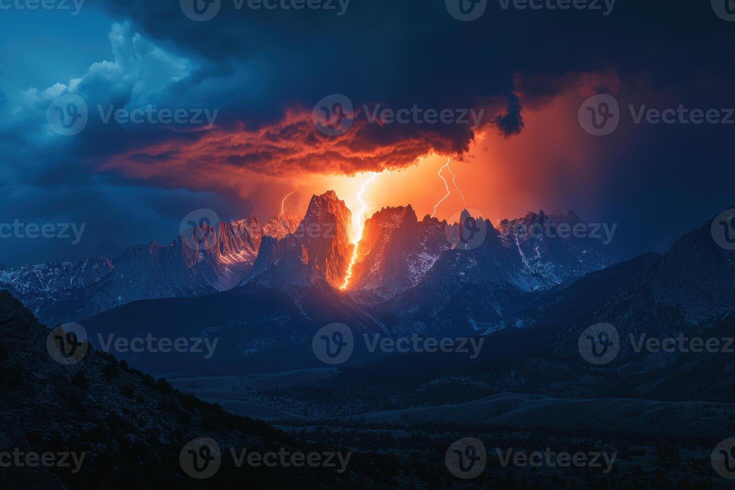 Dramatic landscape view of dark mountain range with bright lightning strikes during an orange sunset or sunrise under cloudy skies. photo