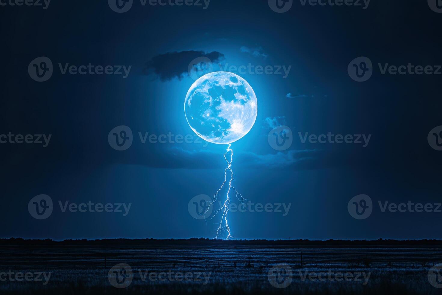 Bright full moon shines above dark field. Lightning strikes down from the moon in the blue night sky. Stormy dark weather. photo