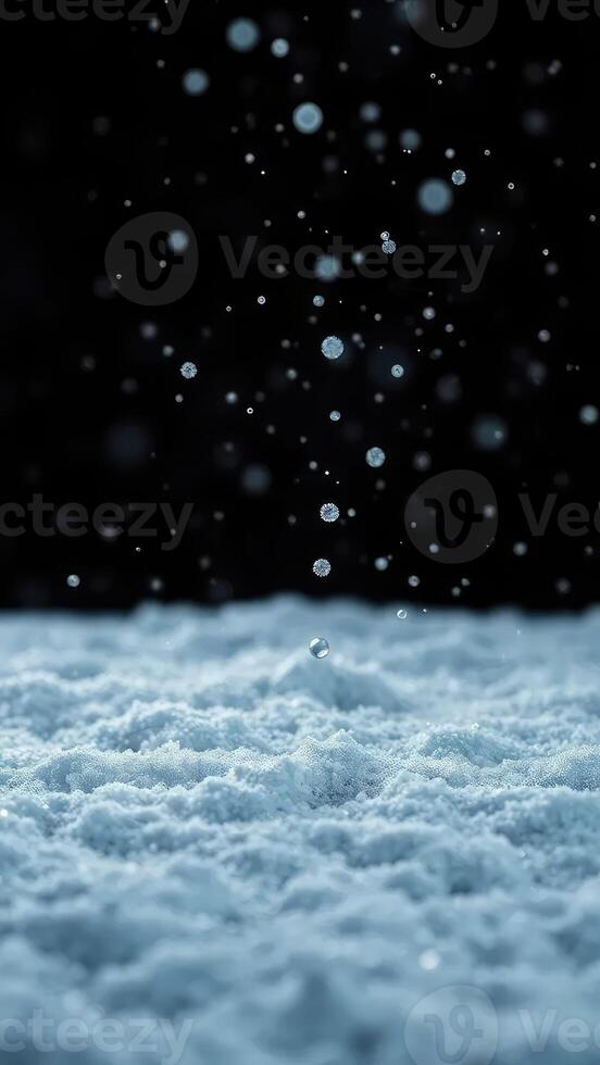 A close up of snow falling from the sky photo