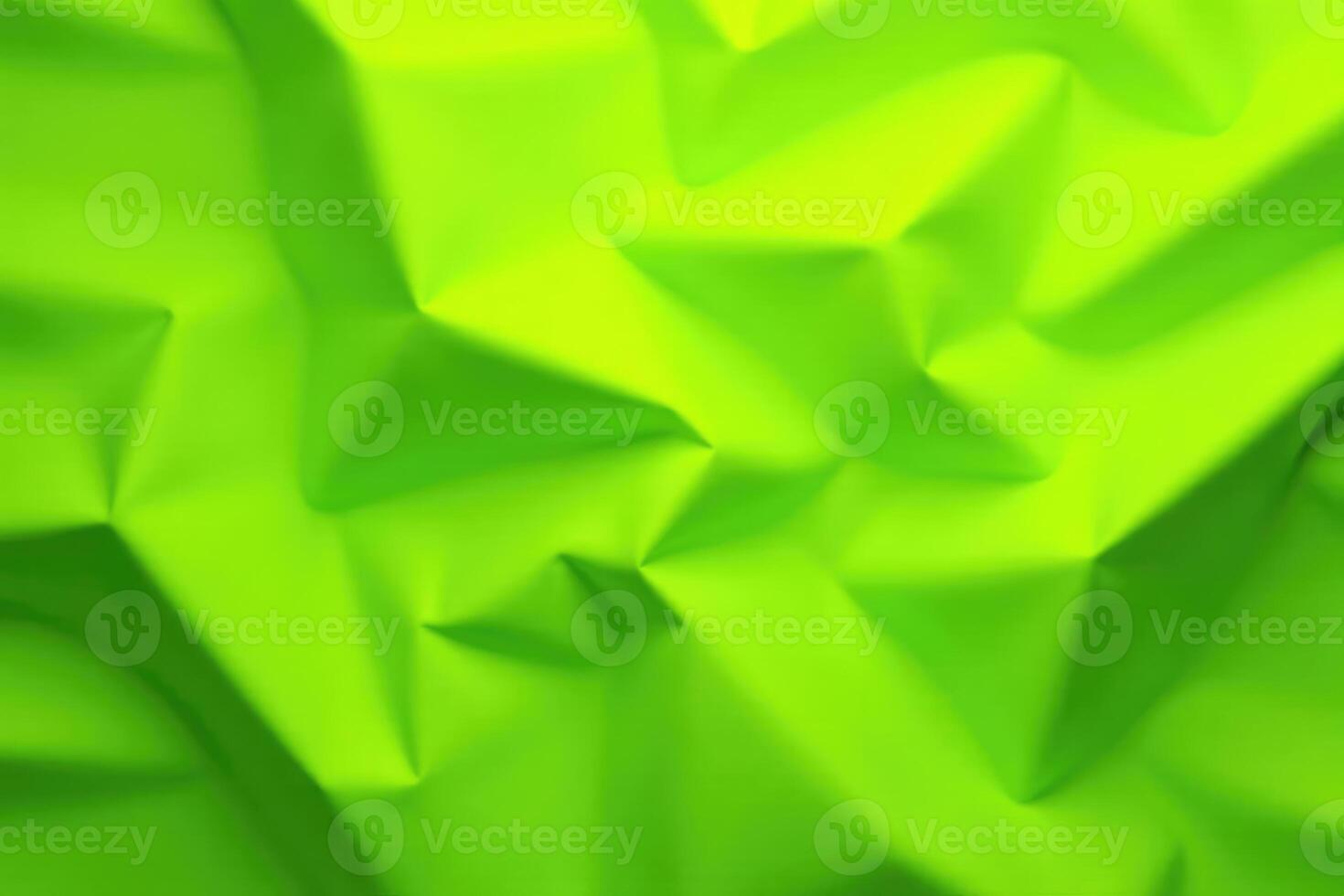A green fabric with folds and folds photo