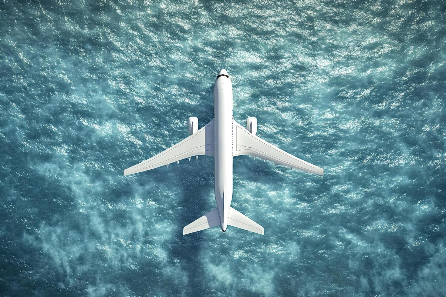 White passenger airplane flying over the ocean photo