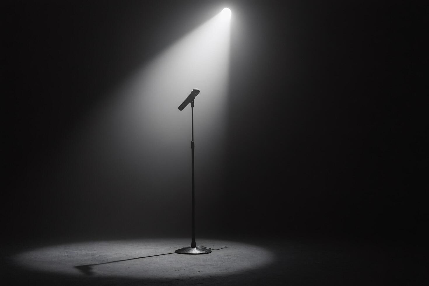 Spotlight illuminating microphone on stage, ready for performance photo