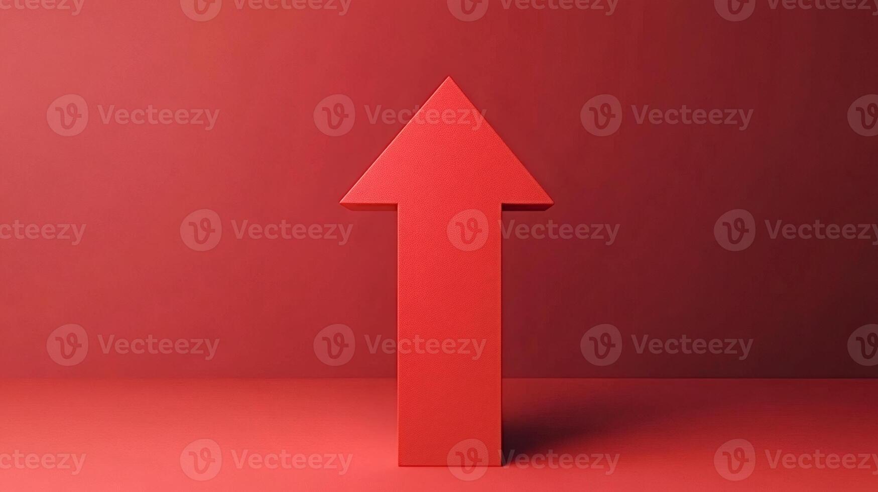 Red arrow pointing up symbolizing growth on red background photo