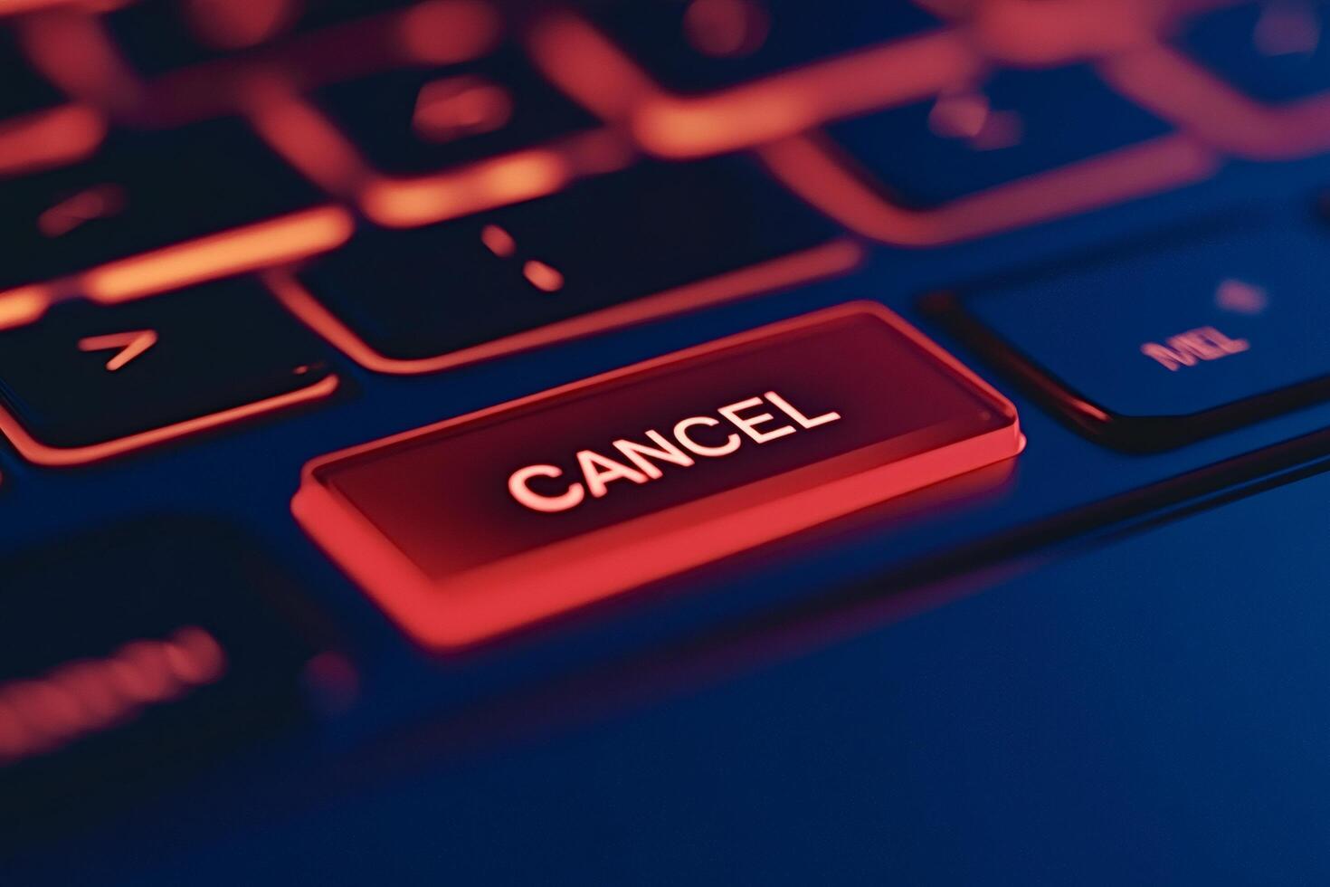 Cancel key glowing red on backlit keyboard photo
