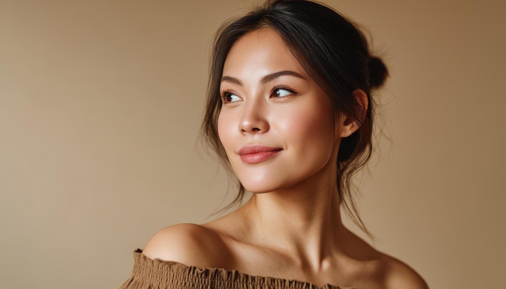 Elegant Woman Portrait with Soft Background and Copyspace in a Minimalist Environment photo