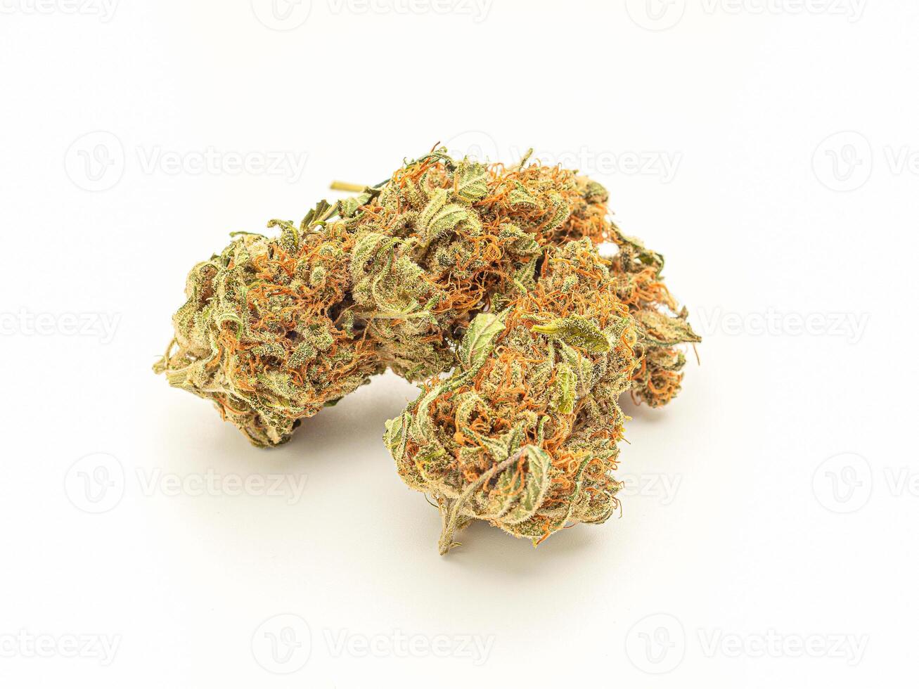 Close-up of dry marijuana buds flower on a white background. photo