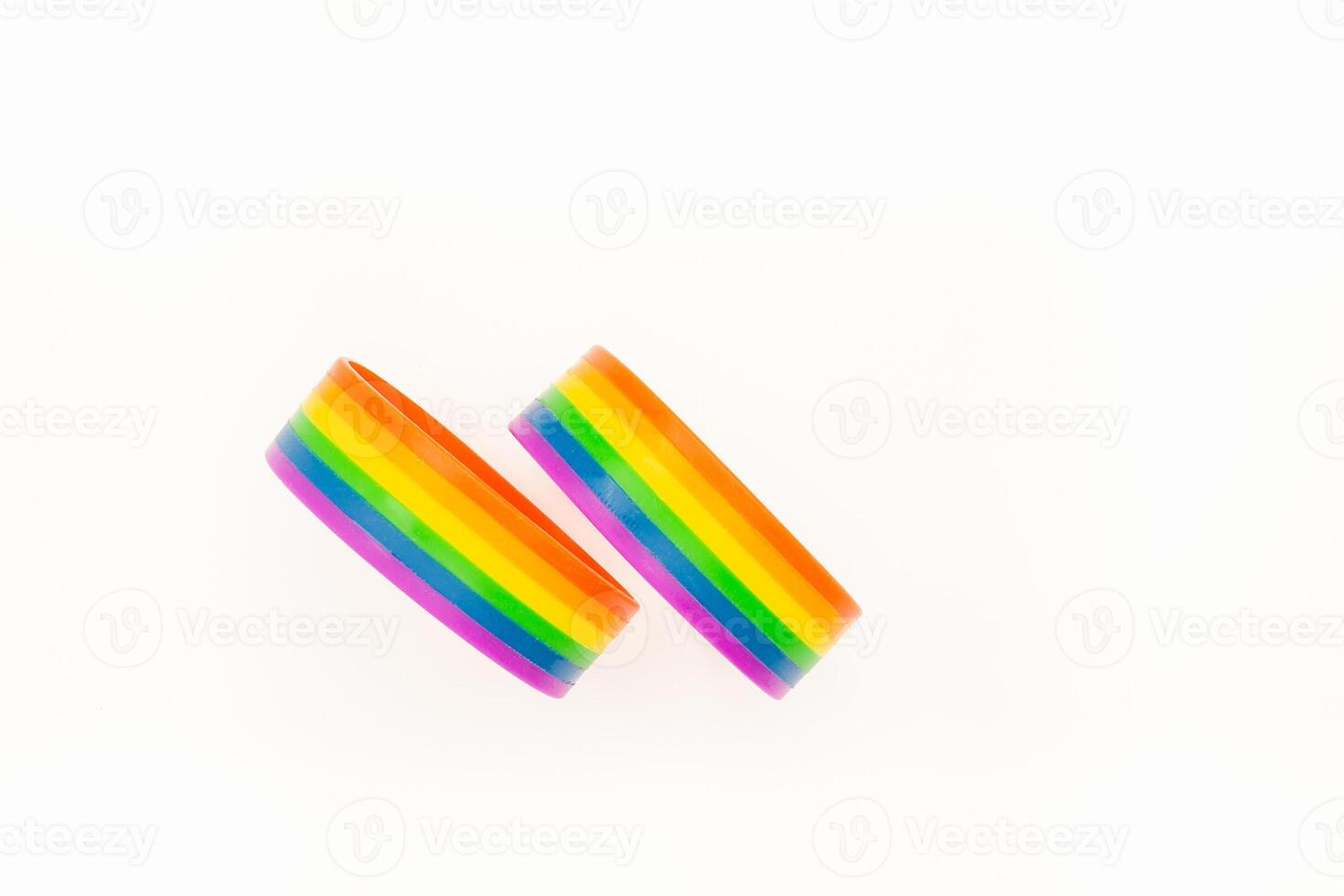 Rainbow wristbands are on a white background. Top view. photo