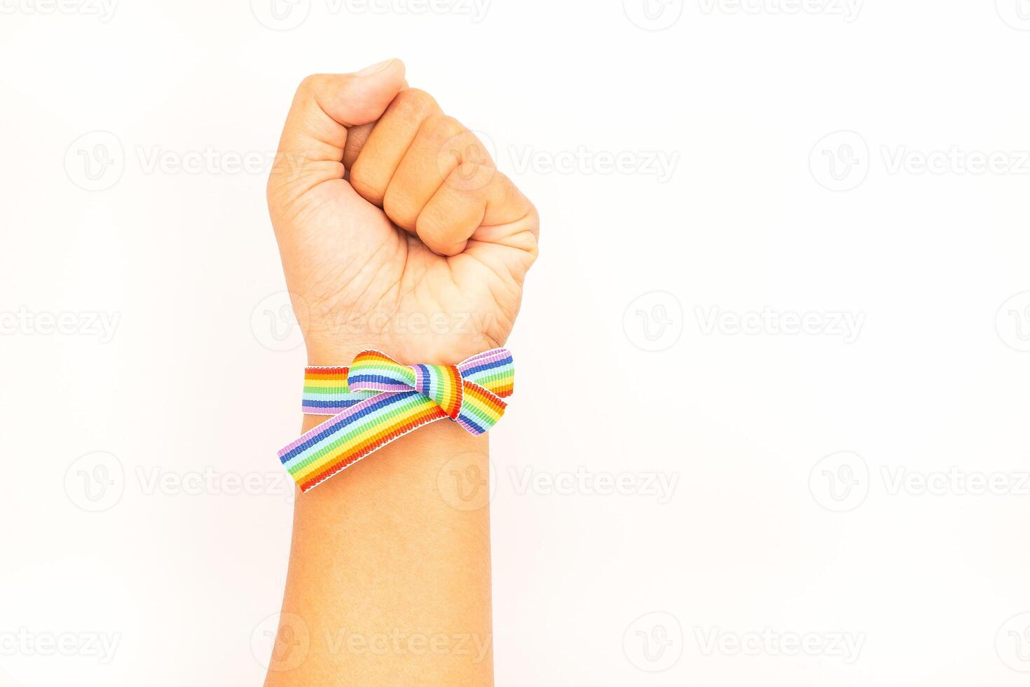 Top view of rainbow wristband in the wrist on a white background. photo
