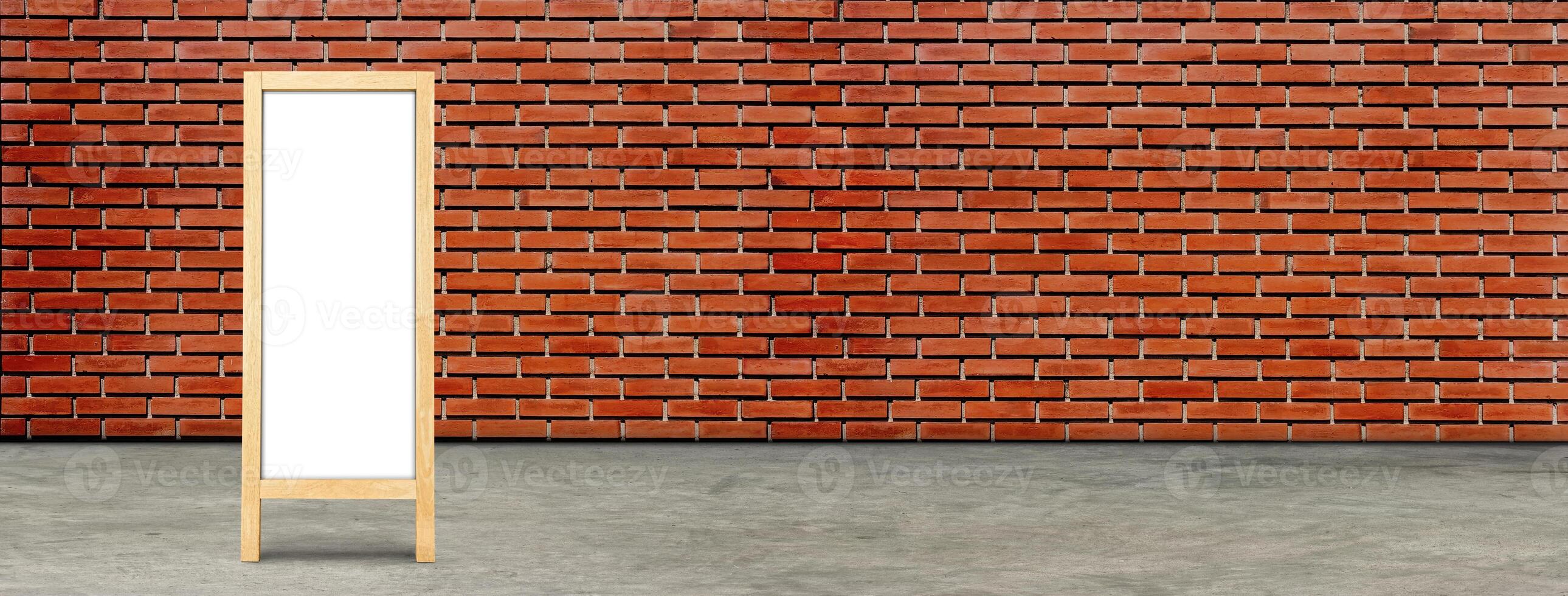 Whiteboard, blank board with space for text, red brick wall background. photo