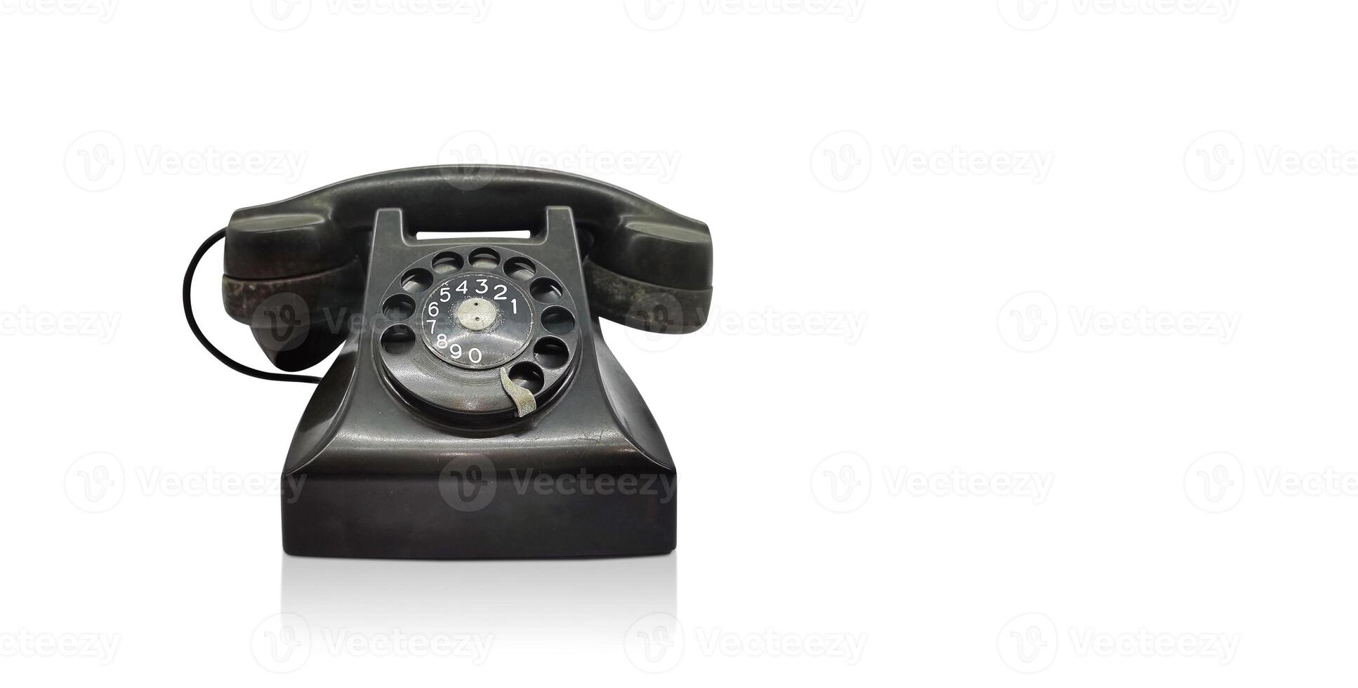 Front view of vintage office telephone, isolated on white background. photo
