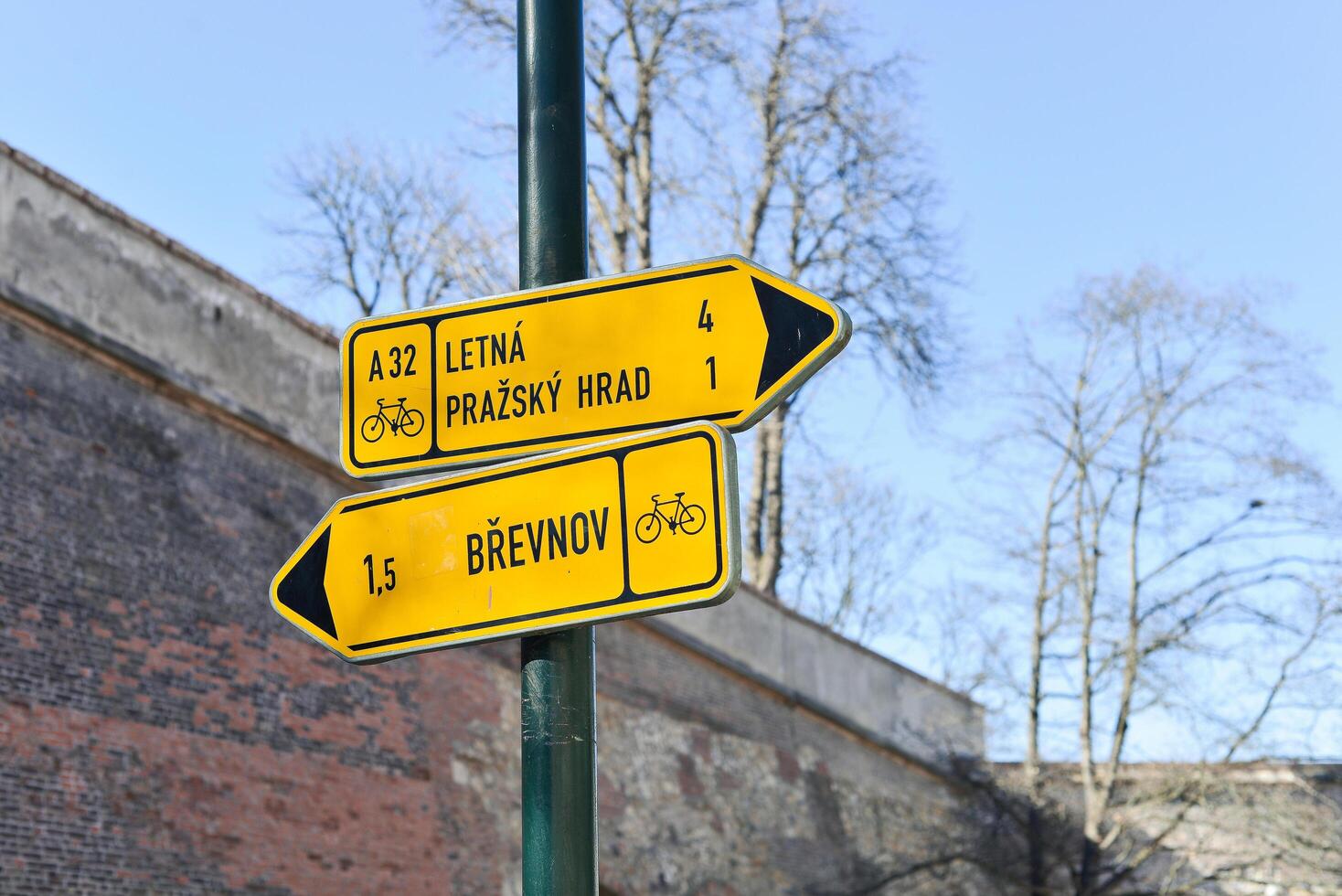 Yellow directional boards in Prague photo