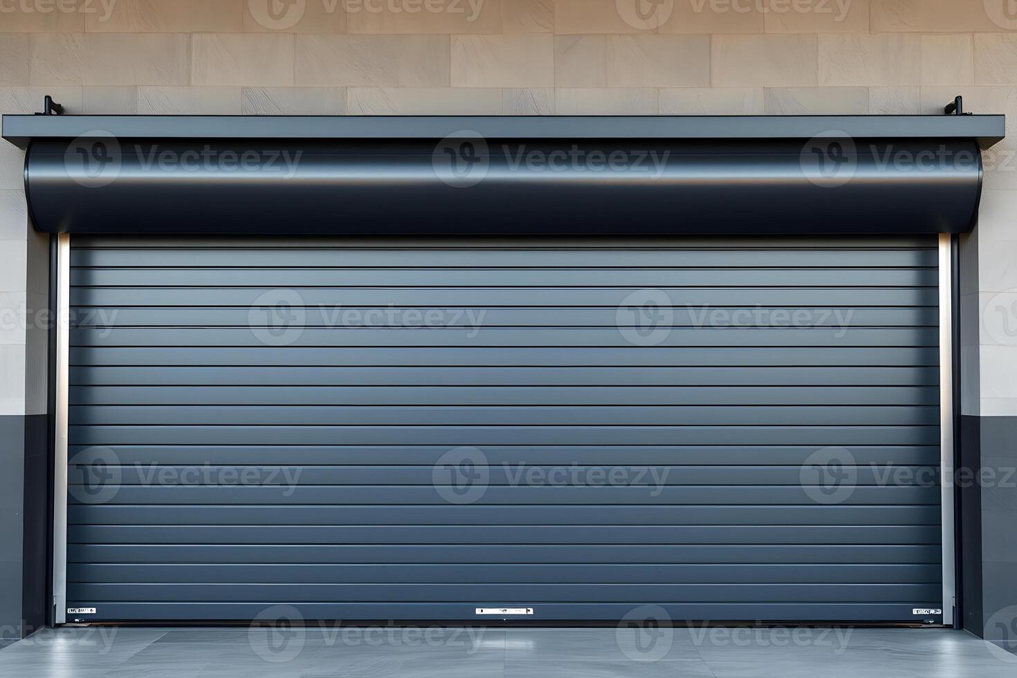 A closed, dark gray industrial roller shutter door, showing horizontal lines, security, and a robust design for commercial or warehouse use. photo