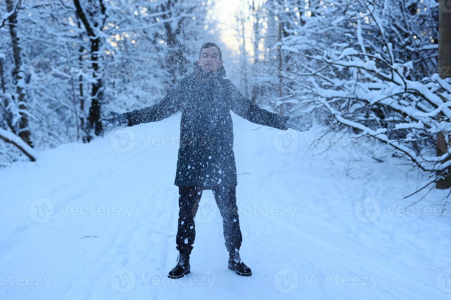 Experience the Joyful Moment in a Beautiful Snowy Winter Landscape full of Cheerful Bliss photo