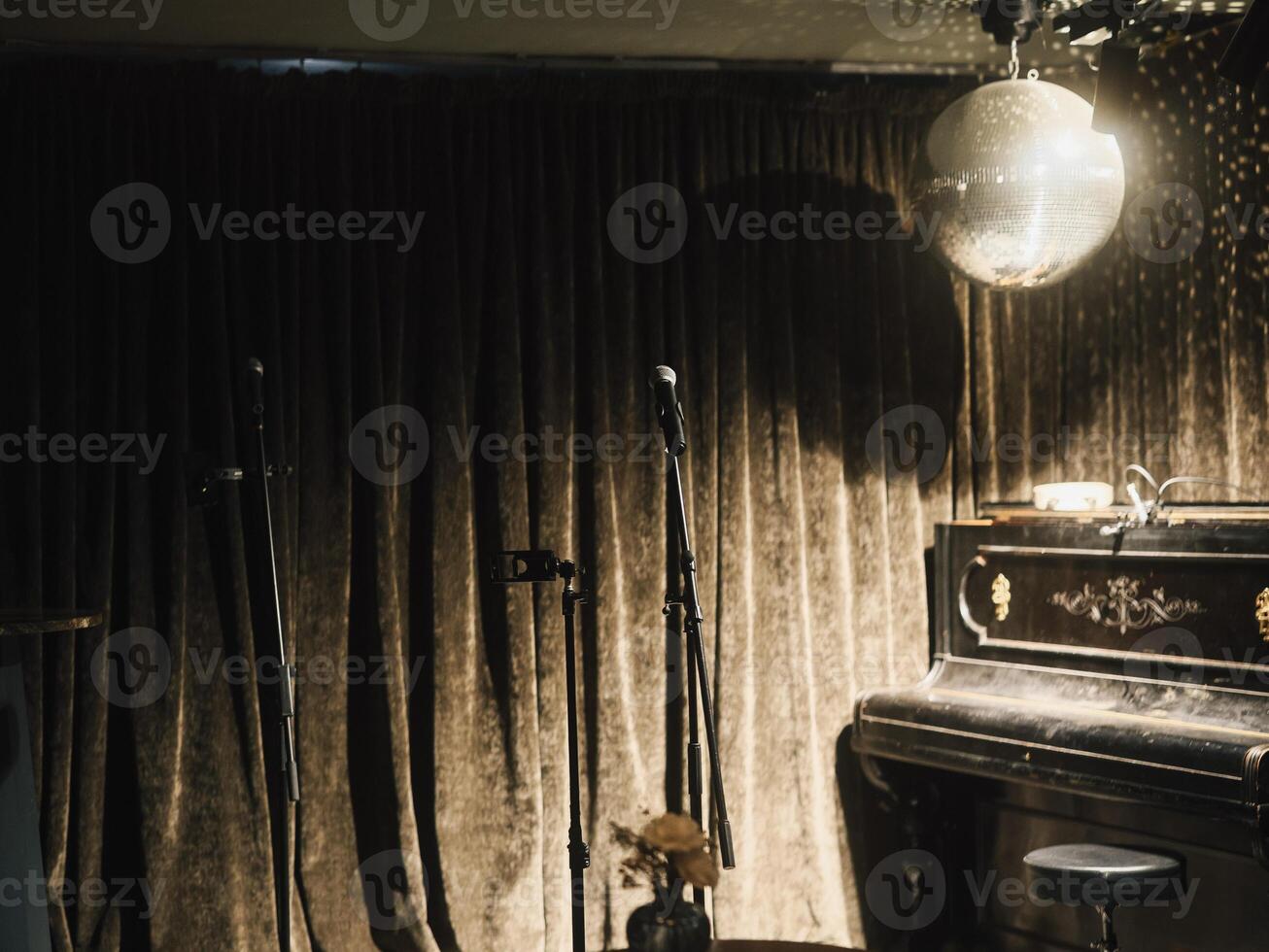 Elegant music venue with a beautiful piano and professional microphones for memorable performances photo