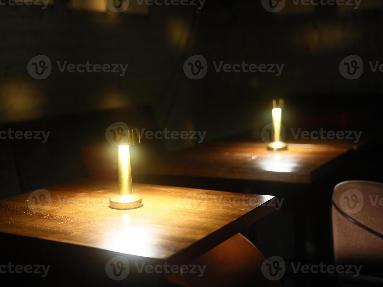 An Intimate Dining Setting Featuring Soft Ambient Lighting, Perfect for Memorable Evenings photo