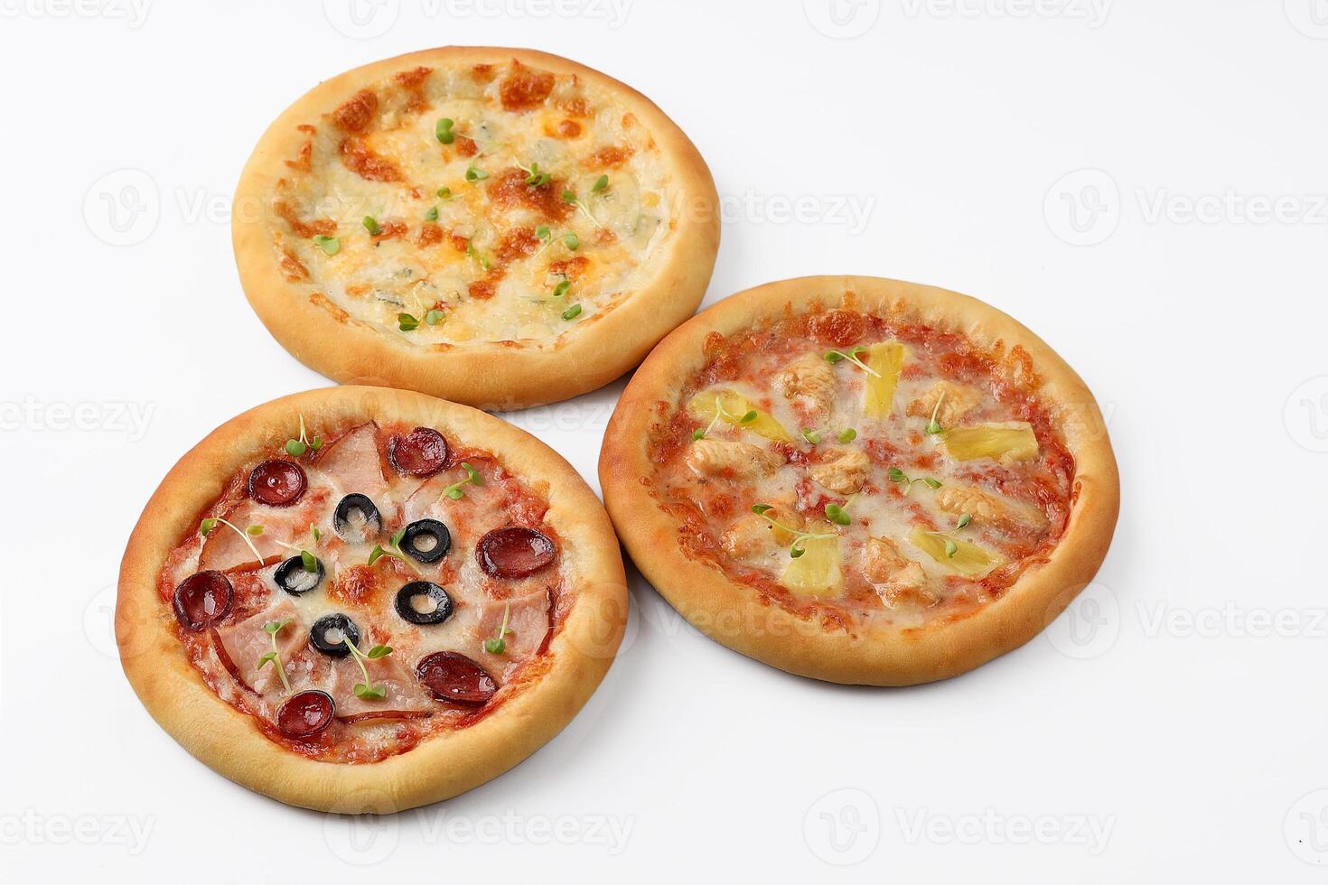 Three popular mini pizzas on a white background. isolate. Fast food for cafe menu photo