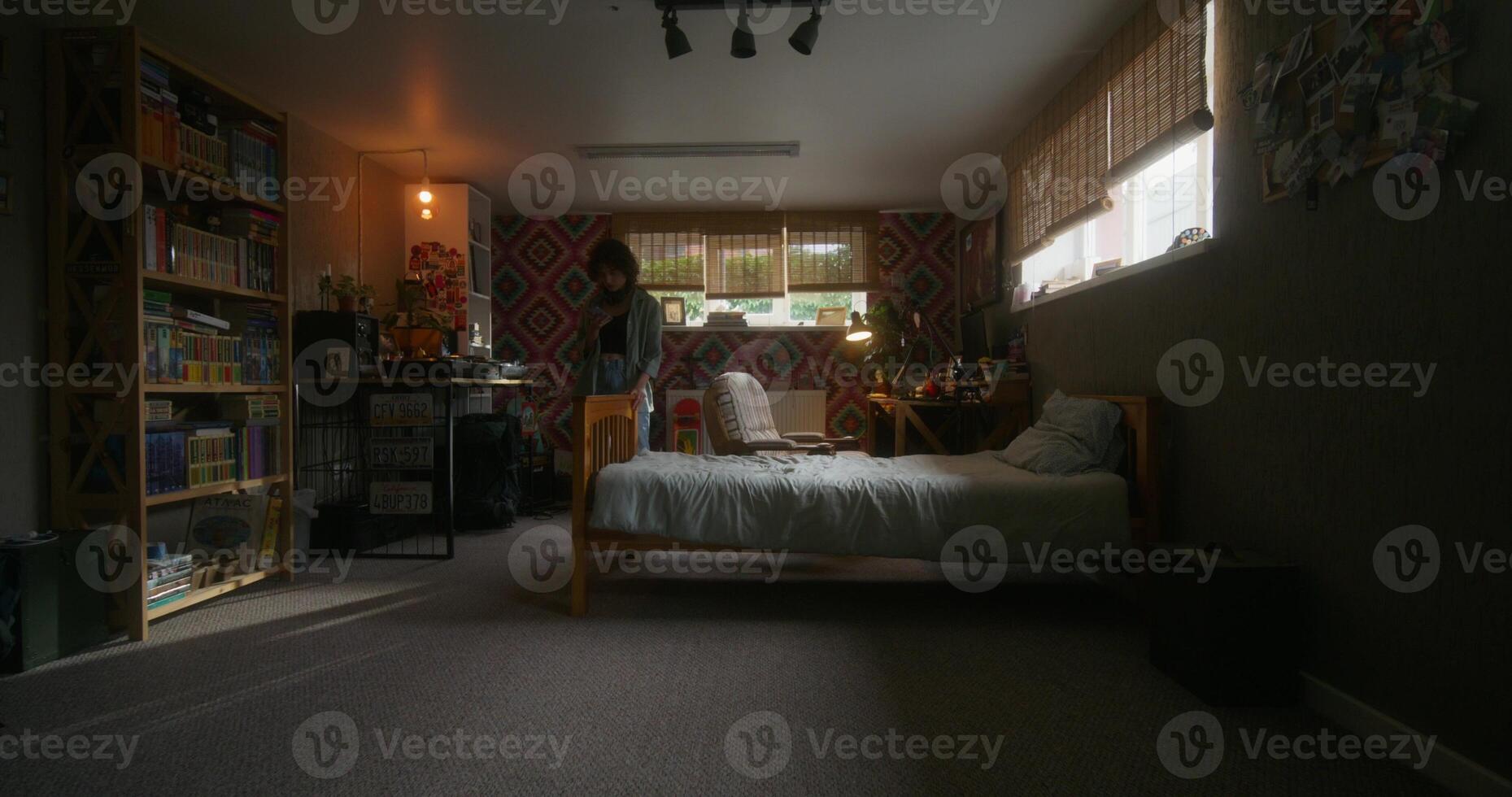 A bedroom with a bed and a desk photo