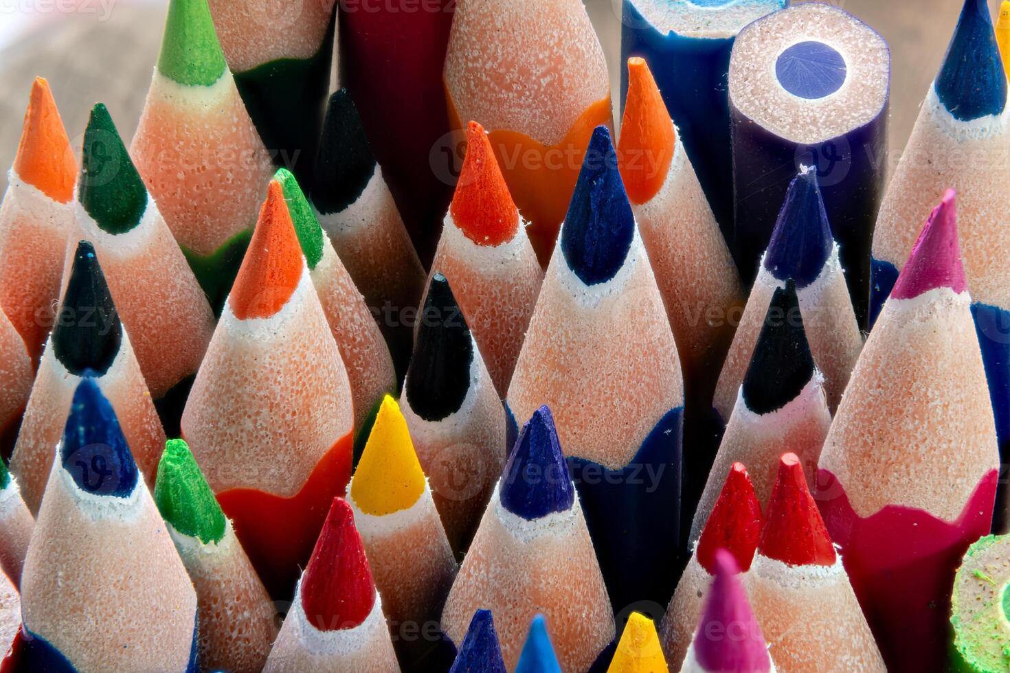 Close-Up of Sharpened Colored Pencils.Creative Vibrant Color Pencils in Macro. Sharpened Rainbow-Colored Pencils Arranged Vertically photo