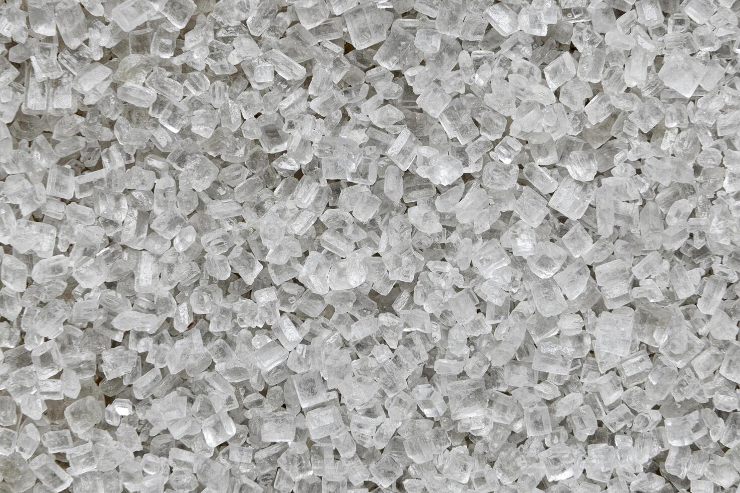 Salt Crystal Macro Texture. Abstract White Crystal Pattern. White Sugar Crystals in Macro photo