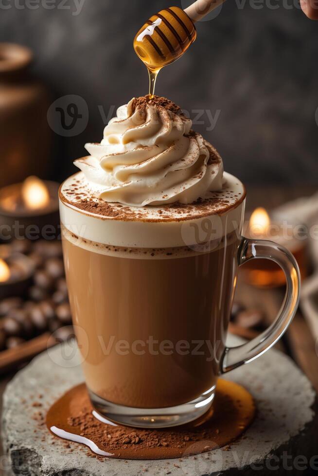 A delicious coffee topped with whipped cream and honey, set in a cozy atmosphere. photo
