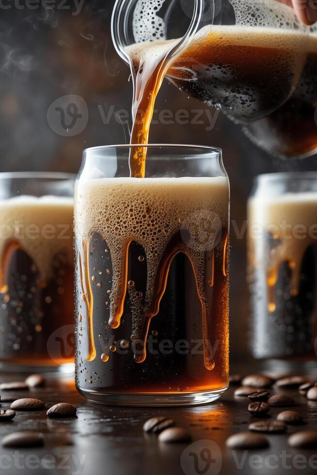 A close-up of coffee being poured into glasses, showcasing rich foam and coffee beans. photo