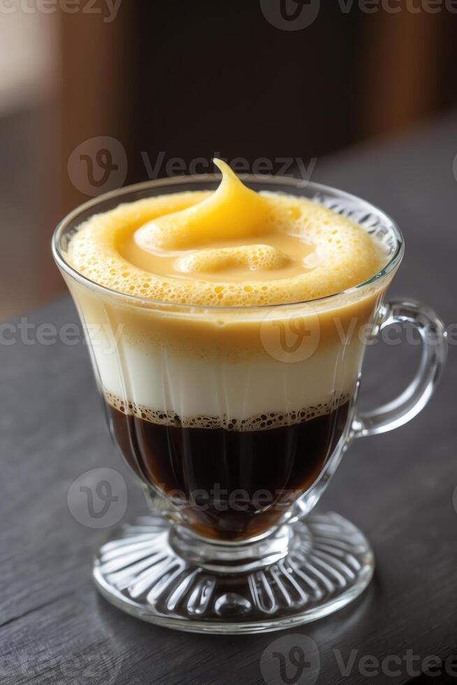 A visually appealing coffee beverage with layered textures and creamy topping. photo