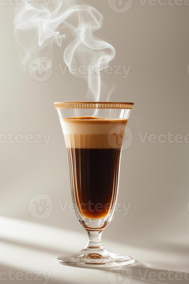 A steaming layered coffee drink in an elegant glass, showcasing its rich colors and textures. photo