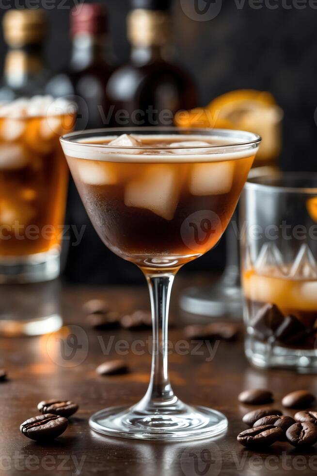 A stylish cocktail glass filled with a dark beverage and ice, surrounded by coffee beans and bottles. photo