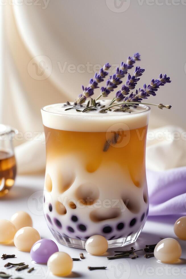 A decorative beverage with layers, topped with lavender, showcasing a blend of flavors. photo