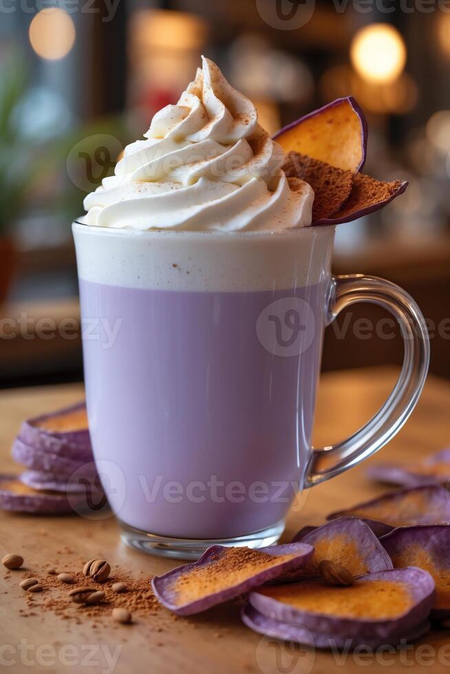 A vibrant purple beverage topped with whipped cream and sweet potato slices, served in a glass mug. photo