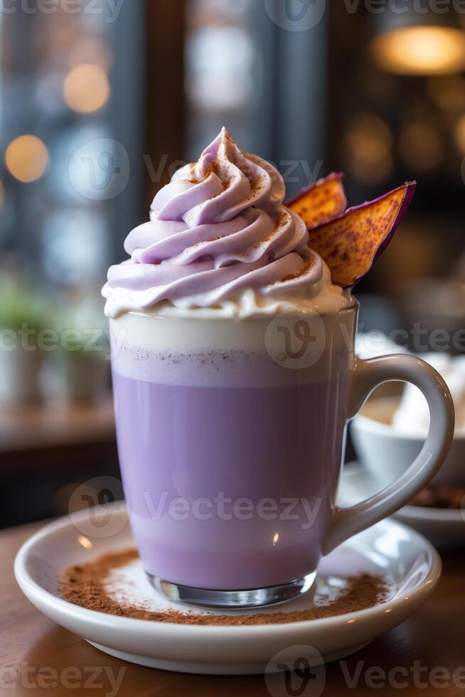 A vibrant purple drink topped with whipped cream and garnished, served in a cozy setting. photo