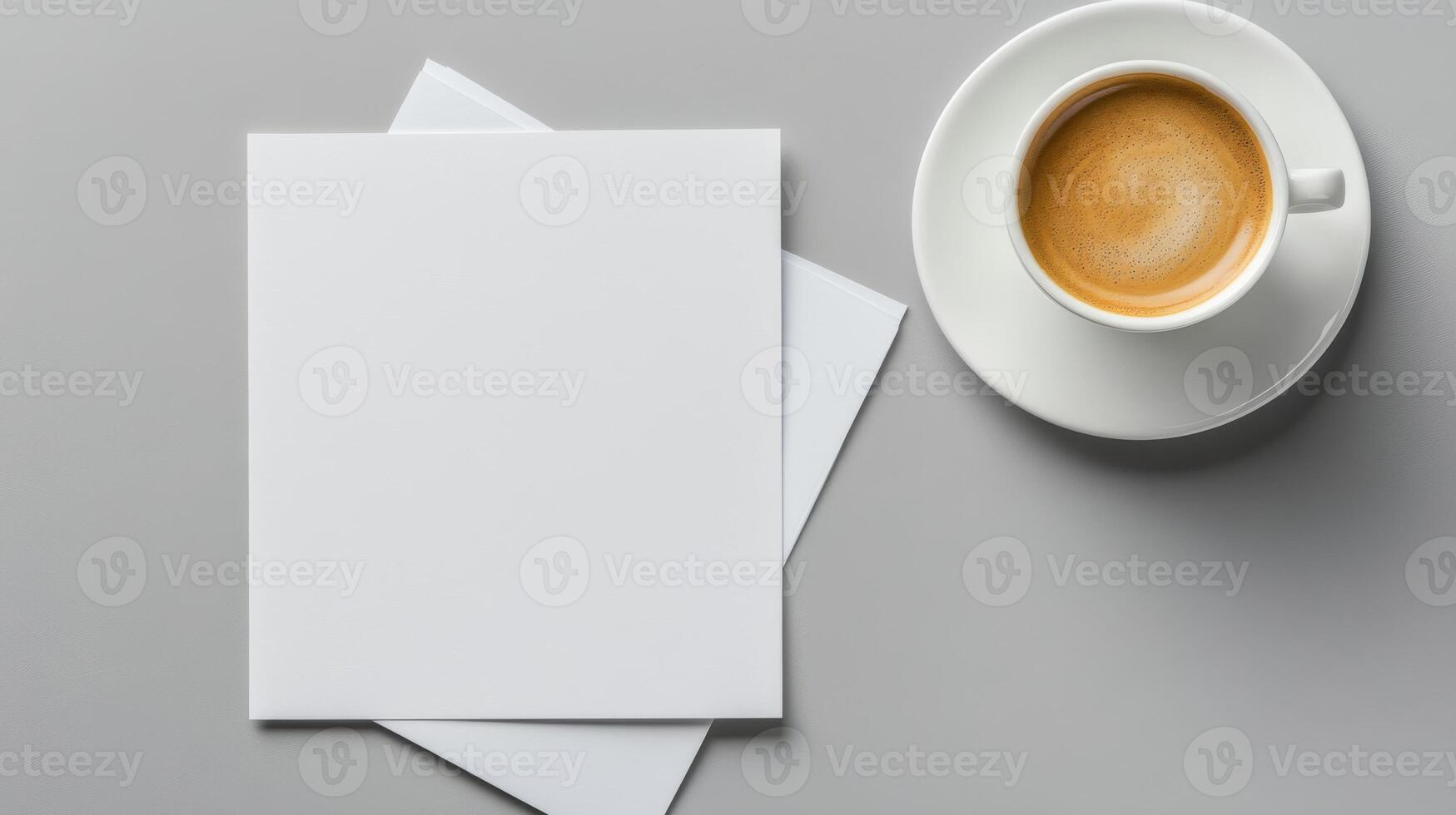 Blank white stationery papers and coffee cup on gray background photo