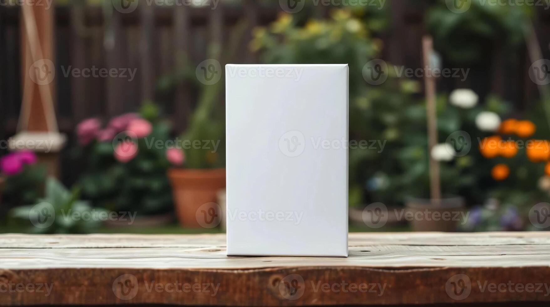 A white box sitting on a wooden table photo