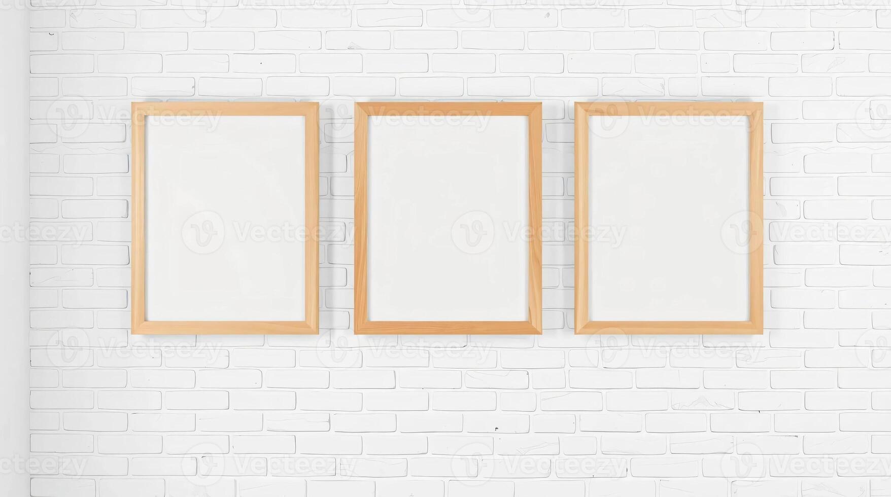Three empty frames on a white brick wall photo