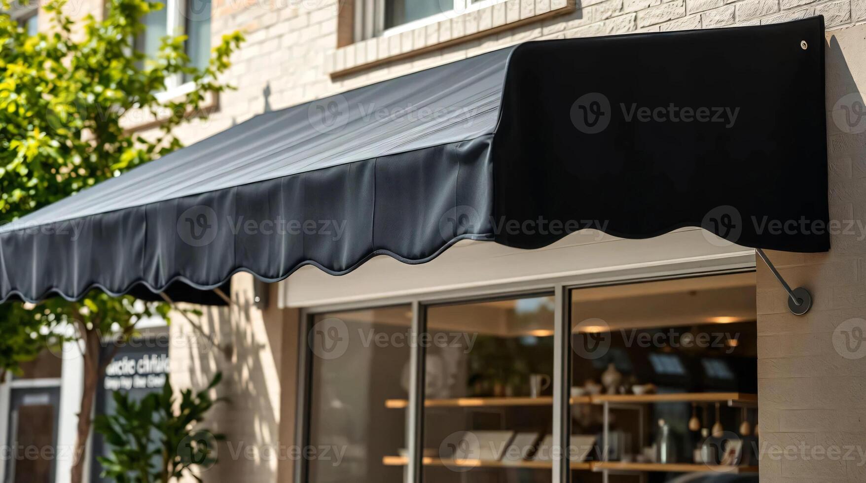 A black awning is hanging over a store photo