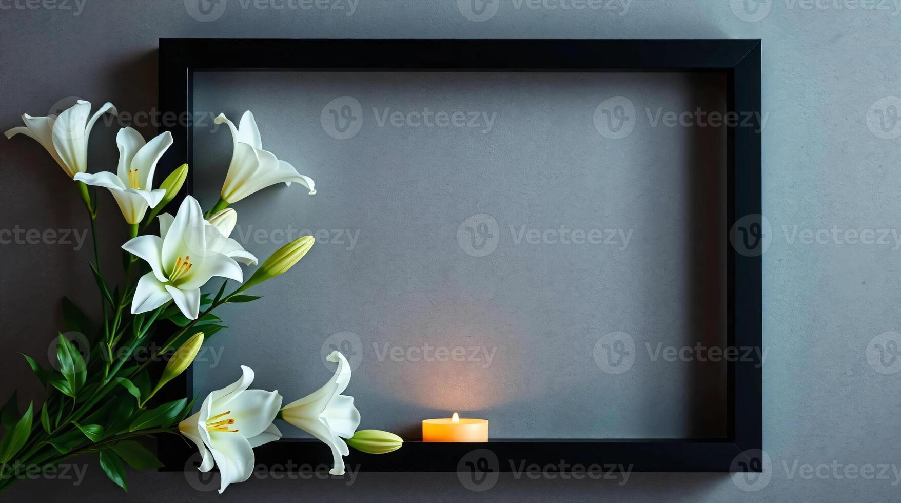 White lilies and candle in black frame on gray background photo