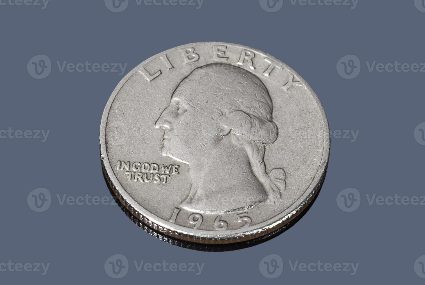 US quarter dollar coin on dark background photo