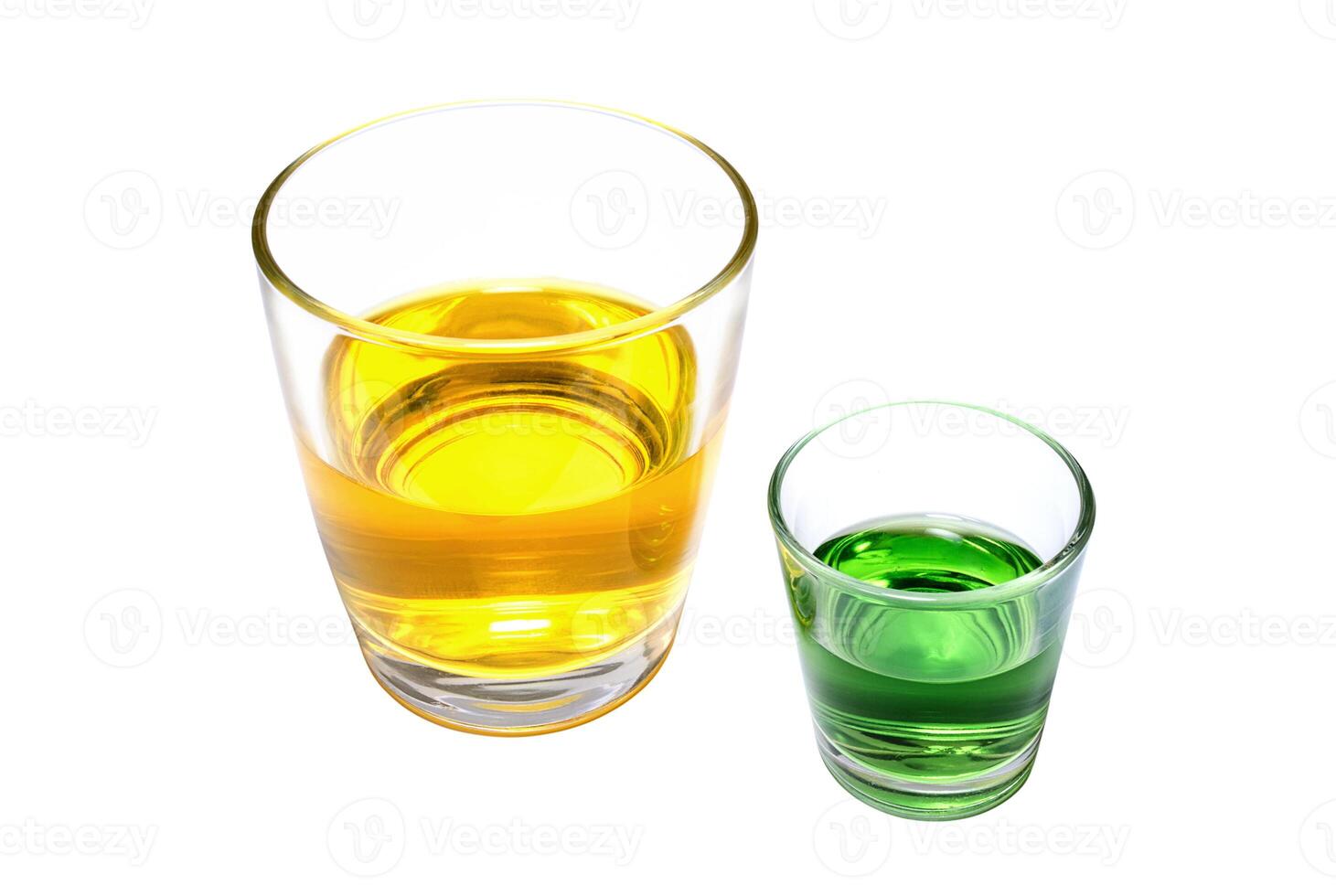 Glasses with a yellow and green drinks photo