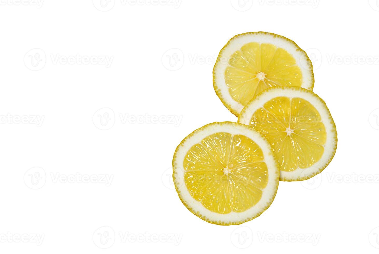 Several lemon slices on a white background photo