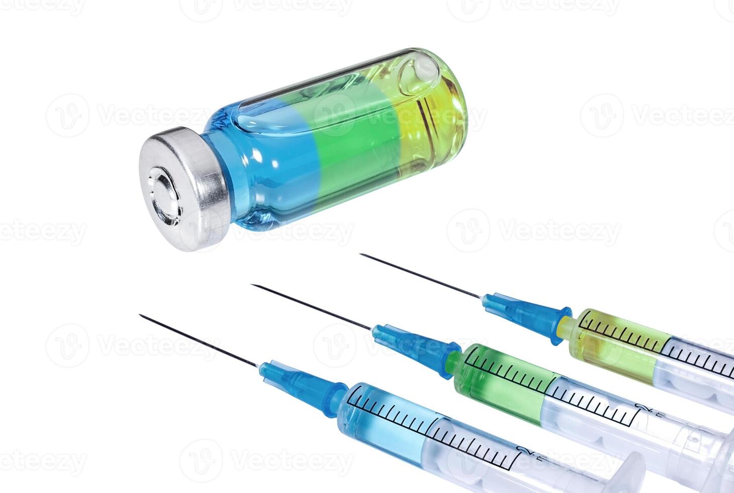 Three syringes with multicolored vaccine and medical vial on white background photo