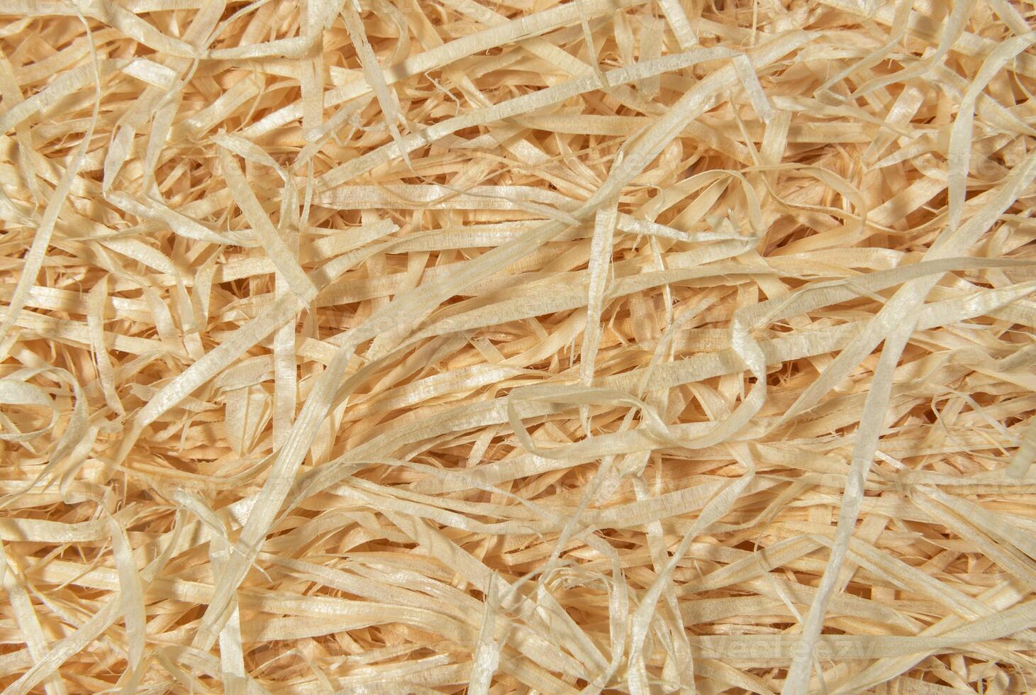 Wooden sawdust shavings background photo